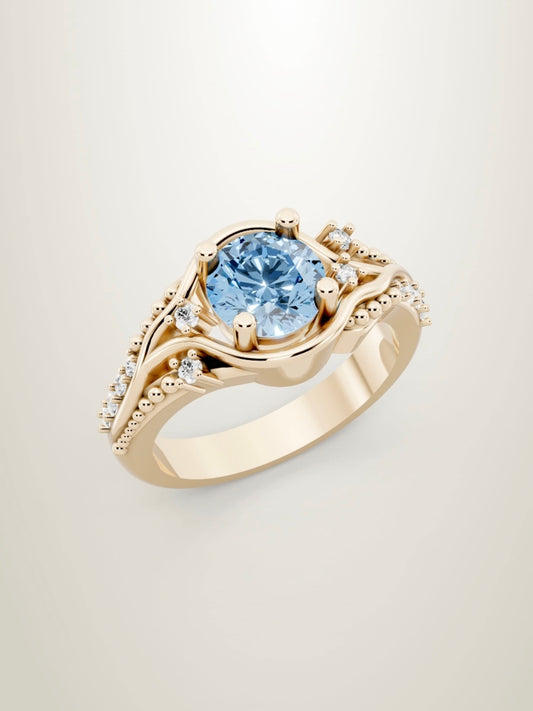 Ocean inspired blue diamond engagement ring