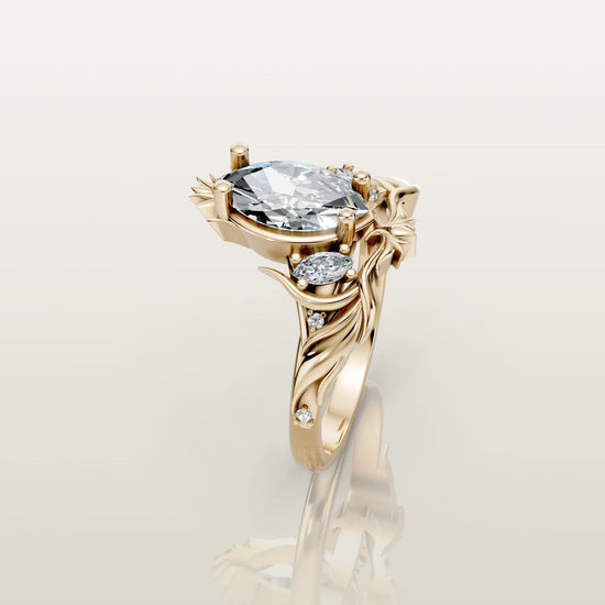 Custom marquise diamond ring inspired by flowing fire in yellow gold