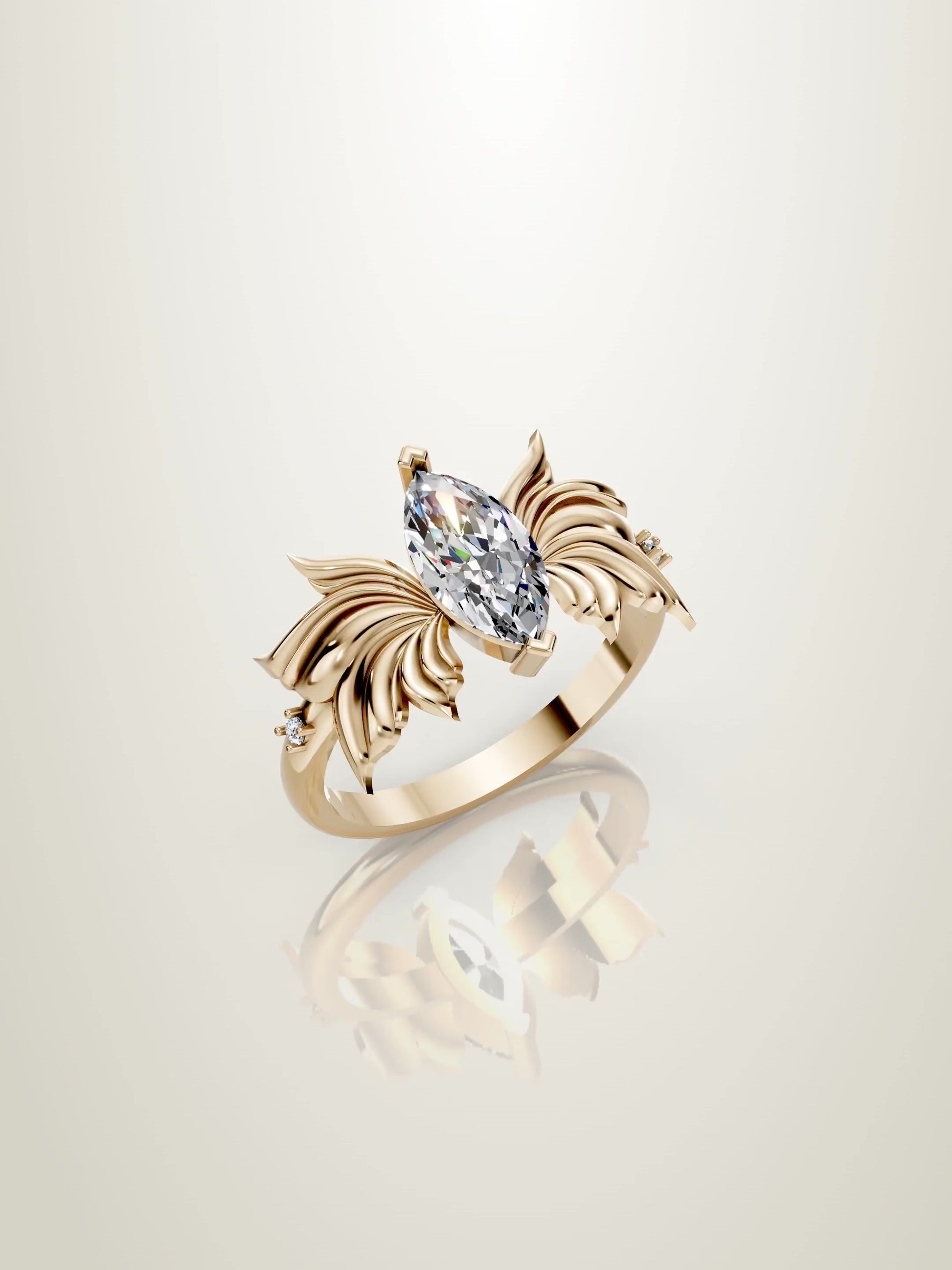 Nature inspired marquise diamond ring with butterfly wings